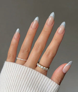 Sea Salt handmade press-on nails featuring SKy blue french tip nails