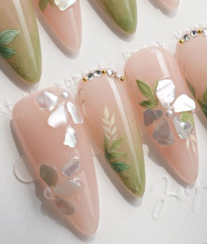 Shell Blossom handmade press-on nails featuring Gentle Pink & Green Gradient, Shell Fragment Petals & Hand-painted Leaves.