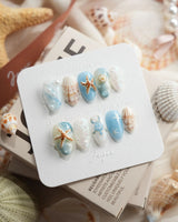 Shell Picking extra short almond press-on nails with seashells and starfish accents