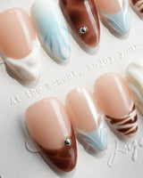 Shore Blend clean summer nails with architectural color blocks and glossy finish