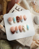 Shore Blend coastal color-block press-on nails in extra short almond shape