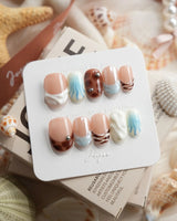 Shore Blend coastal color-block press-on nails in short oval shape