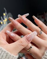 Silent Night nail art close-up showing Champagne Gold Glitter, Christmas Reindeer & Snowflakes. details