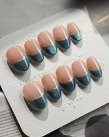 Silk Azure press-on nails in extra short almond shape — Ice Blue Cat Eye, French Silver Wire.