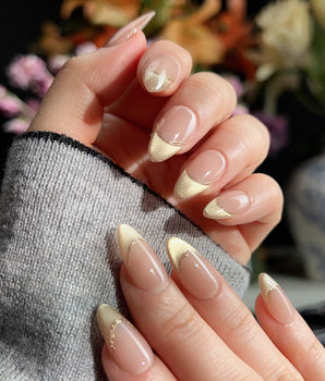 Silk Glow handmade press-on nails featuring Light Gold Cat Eye, French Gold Wire.