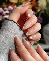 Silk Mousse handmade press-on nails featuring Champagne Cat Eye, French Silver Wire.