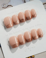 Silk Mousse press-on nails in extra short coffin shape — Champagne Cat Eye, French Silver Wire.