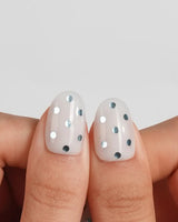 Silver Rain short oval nails with chrome silver polka dots on white grey base