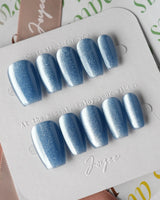 Sky Cat-eye press-on nails in short coffin shape — blue cat eye nails