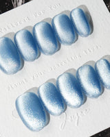 Sky Cat-eye press-on nails in short oval shape — blue cat eye nails