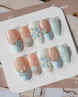 Slushie Blueberry handmade nails with soft nude, blue plaid, and raised fruit details