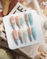 Slushie Blueberry long stiletto nails with icy blue plaid and hand-painted berries
