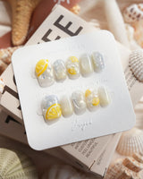 Slushie Lemon extra short square nails with icy slushie glitter and yellow lemon charms