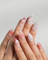 Slushie Strawberry candycore press-on nails with strawberry soda shine and shell accents