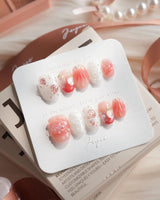 Slushie Strawberry extra short oval nails with pink gradient and 3D strawberry details