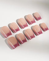 Soft Glow press-on nails in extra short coffin shape — Pinkish Purple Cat Eye, French Glittery Stars.