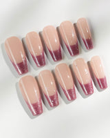 Soft Glow press-on nails in long coffin shape — Pinkish Purple Cat Eye, French Glittery Stars.