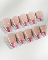 Soft Glow press-on nails in short stiletto shape — Pinkish Purple Cat Eye, French Glittery Stars.