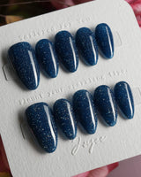 Glitter Glitz Navy press-on nails in short almond shape — deep blue cat eye glitter nails