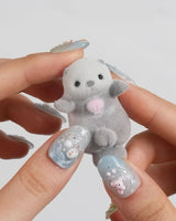Splash Club custom press-on nails with cute animals floating in blue pool water