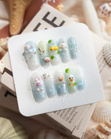 Splash Club pool animal press-on nails in medium square shape