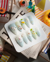 Splash Club pool animal press-on nails in medium stiletto shape