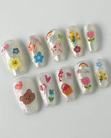 Squishy Pop medium coffin nails with lively decals and reusable press-on finish