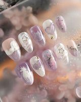 Stargaze close-up of lavender cat-eye gel, 3D hearts, stars, and whimsical cat details