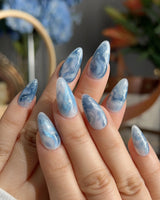 Starry River close-up of hand-painted blue-white swirls and fine silver shimmer