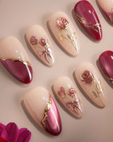 Sugar Thorn handmade press-on nails featuring Classic Rose Red, 3D Metallic Rose Reliefs & Contrast French Tips.