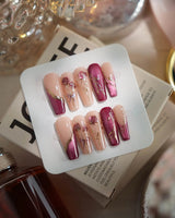 Sugar Thorn press-on nails in long coffin shape — Classic Rose Red, 3D Metallic Rose Reliefs & Contrast French Tips.