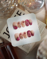 Sugar Thorn press-on nails in short oval shape — Classic Rose Red, 3D Metallic Rose Reliefs & Contrast French Tips.