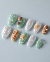 Mauritius Escape summer nail set with pearly mint, shell texture, bubbles, and starfish