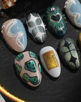 Mindbend extra short almond nails with surreal 3D waves, chrome accents, and cool earthy tones
