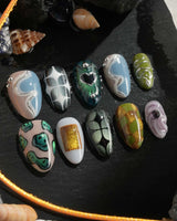 Mindbend close-up of heart accent, distorted shapes, and playful surreal nail art