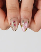 The Botanist nail art close-up showing Vibrant Secret Garden, Multi-colored Hand-painted Florals & Metallic Edging. details