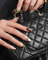 THE HEIR medium almond press-on nails with horse silhouettes, plaid accents and glossy finish