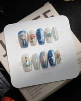The Little Prince handmade press-on nails in short coffin shape by Joyee Nails