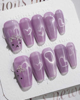 Thump Bunny_Taro press-on nails in medium coffin shape — Lavender Purple, Heart Magnet Cat Eye.
