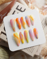 Tutti Frutti rainbow gradient press-on nails in medium stiletto shape