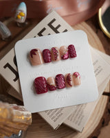 Velvet Flow extra short square press-on nails with red cat-eye shimmer and butterfly wings