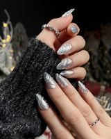 Velvet Frost handmade press-on nails featuring 3D Spiral Texture, Silver Glitter Effect.
