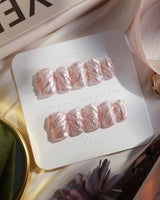 Velvet Twist press-on nails in extra short coffin shape — Pink silver chrome swirl 3D sculpted glitter overlay