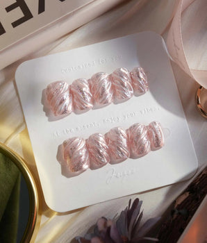 Velvet Twist press-on nails in extra short coffin shape — Pink silver chrome swirl 3D sculpted glitter overlay