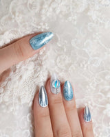 Frozen Dream press-on nails — ice blue ombre silver chrome snowflake charm handmade nail art by Joyee Nails