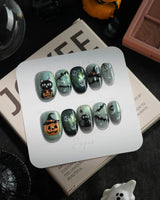 Witch's Cat handmade press-on nails in short oval shape by Joyee Nails