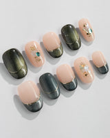 Woodland Sea press-ons with woodland green shimmer, gold French lines, and glossy shell accents