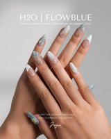 Yasawa Blue custom-size nails with jelly blue shell swirls and pearl beach details