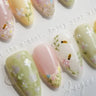 Almond nail designs — hand-painted floral, French tip, and artistic press-on nails in almond shape by Joyee Nails