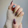 Rich chocolate brown cat eye press-on nails with magnetic shimmer on almond shape — the trending brown nail design for 2026, warm velvet finish handmade by Joyee Nails.